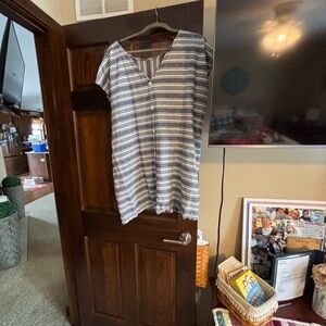 No size or brand striped cover up, I’d say xl